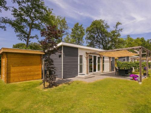 Lochem Ski Chalet | Sunlit Chalet by the Pond