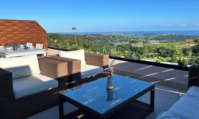 Canales Apartment | The balcony of Oyambre. New exclusive accommodation with sea and mountain views.