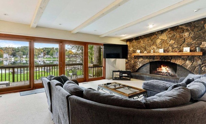 Powers Lake House | The Lake House on Powers |Grassy Frontage |Lakeside Deck |Rec Room w/Pool Table & Bar |Fire Pit