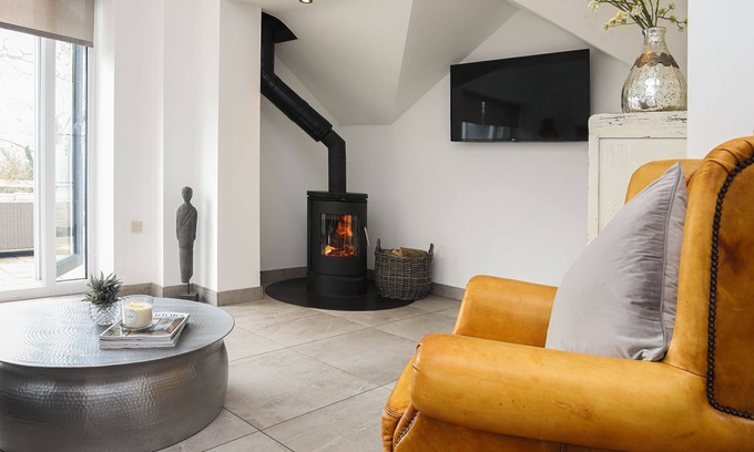 Denbigh Cottage | The Old Piggery - a cosy fire that sleeps 2 guests in 1 bedroom