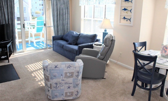 Manteo Condo | Tilli Tyme II | Canal Front w/View | Covered Parking | End Unit