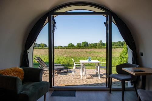 Dalerveen Ski Chalet | Tiny Natuurlodge Graspieper met vrij uitzicht over landerijen