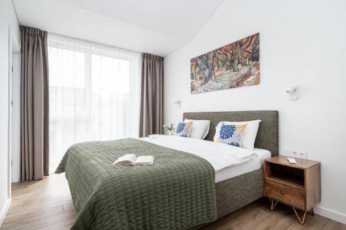 Vilnius Apartment | Top Floor, Spacious Apartment w-Balcony & Garage I Cohost