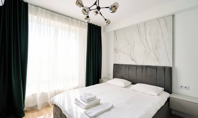 Riscani Apartment | Top Spot in Riscani! 1BR Near Shops & Restaurants