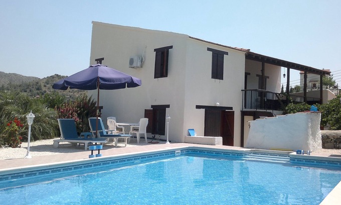 Akapnou House | Traditional large detached village house wih private pool and enclosed courtyard