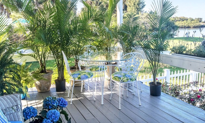 Aripeka House | Tropical Palm Island Paradise Over 6 Acres with Secluded Pool & White Sand Beach