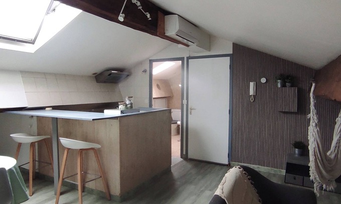 Maraussan Apartment | Under the roof