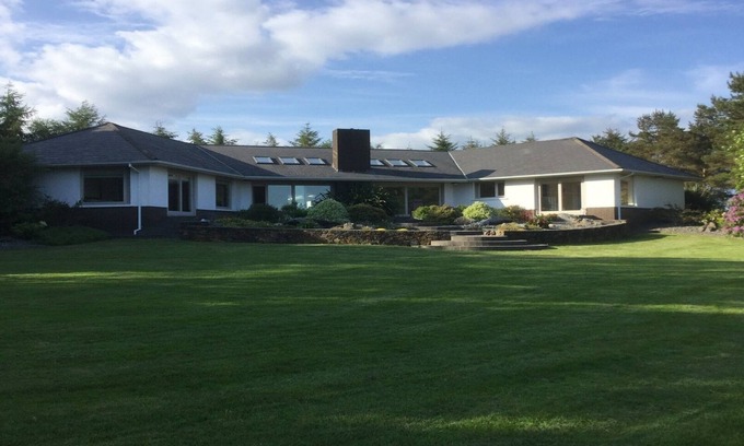 Clonbur House | Unique Comfortable House Overlooking Lake, Mountains And Woodland