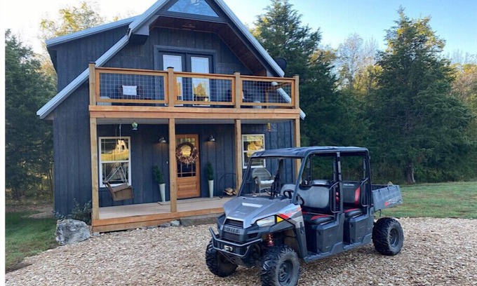 Turners Cabin | Unique/modern, secluded cabin on 95 river front acres/utv/kayaks & hot tub