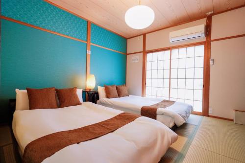 Konohana House | USJまで電車で5分 Meeno Home西九条美の宿親子向け民泊 ReFa美顔シャワー付き 広々空間 好アクセス