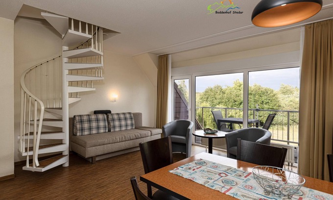 Buschvitz Apartment | Vacation apartment 54 - comfort and tranquillity on two levels with balcony and WiFi