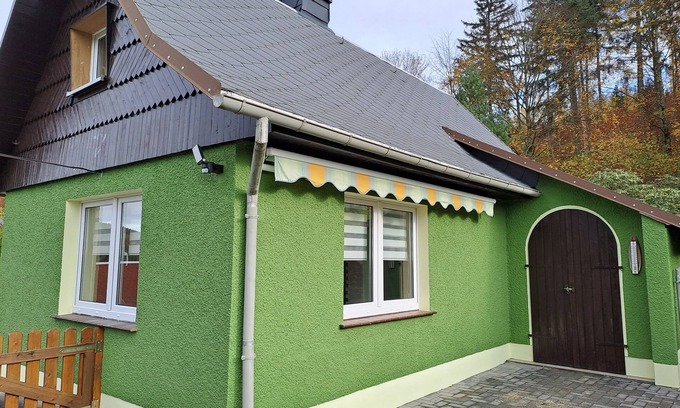 Schmiedeberg House | Vacation home Hirschturmblick- Cozy vacation home with terrace and playground