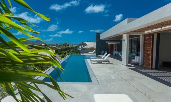 Orient Bay Villa | VILLA Ô, luxurious 4-bedroom villa with mirror pool and sea view