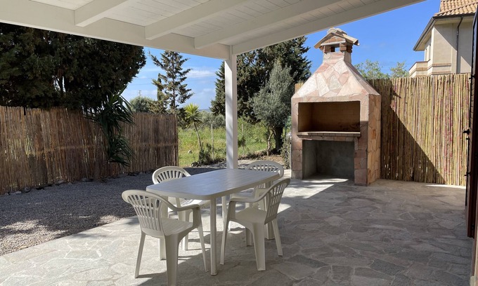 Masainas Villa | Villa "Orchidea" with Garden, Terrace, Balcony & Air Conditioning