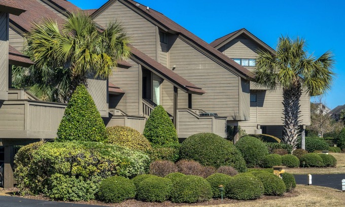 Litchfield by the Sea Condo | Villa with marsh views and pool access located within gated Litchfield By the Sea community.