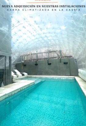 Villa Carlos Paz Cabin | ViviSierras, Carlos Paz casa centro frente al lago, pileta climatizada, 4 dormitorios, 3 baños, quincho