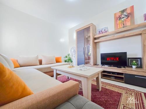 Cite Adrar Apartment | Votre Appartement Idéal - Emplacement stratégique - Parking gratuit - Chambres confortables - Cuisine conviviale