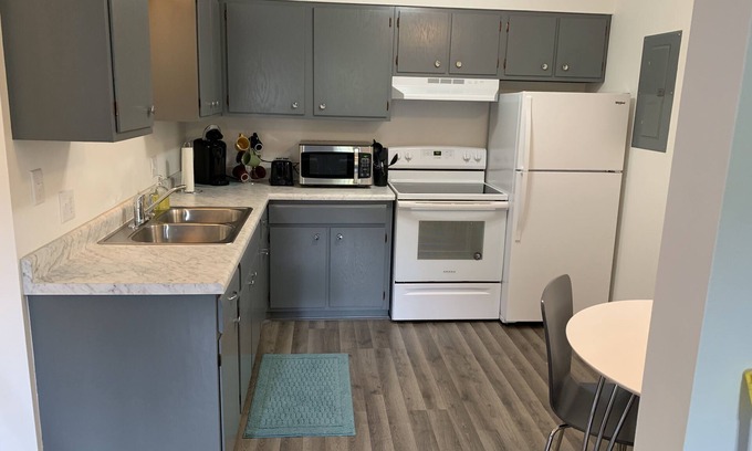 Munising Apartment | Walkable to restaurants pubs and the cruise ship. Central location Apartment