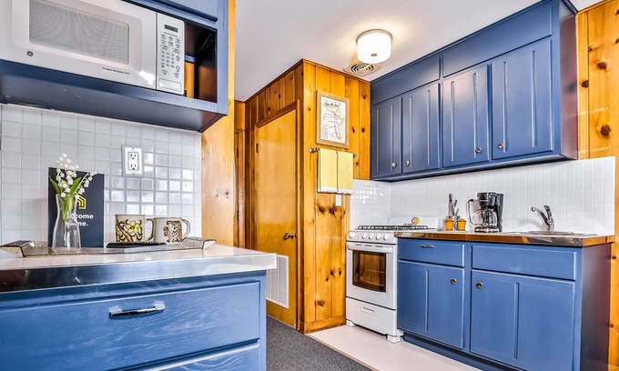 Presque Isle House | Waterfront suite on South Turtle Lake with communal dock, rowboats & firepit