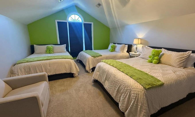 Greensboro House | Welcome to The Clover, a spacious 2-story vacation home that blends charm with modern comfort. Perfect for families, friends, or groups, this cozy retreat features inviting living spaces, a fully equipped modern kitchen & comfortable bedrooms.