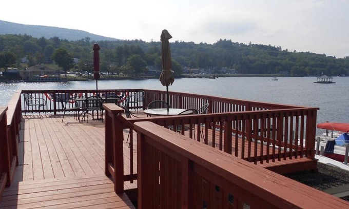 Alton Bay House | Winnipesaukee lakefront house includes slip, deck, hot tub & sleeps up to 11