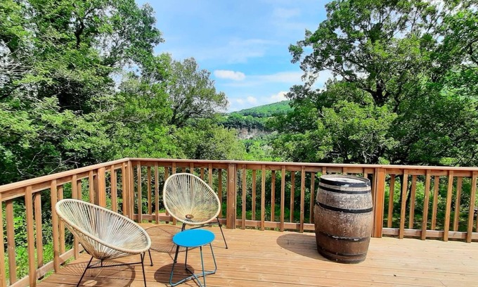 Cazals House | Wooden house with terrace on stilts and superb view