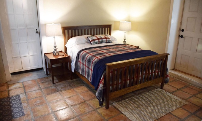 Nambe Pueblo House | Ysabel Adobe- Private Bedroom attached bathroom in century old adobe on 1 acre.