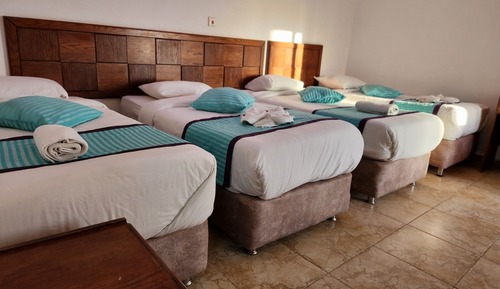 Deluxe Quadruple Room, 1 Bedroom, Balcony, Poolside