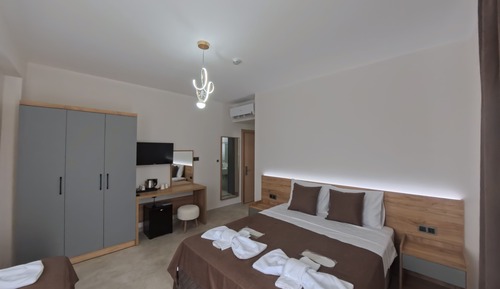 Deluxe Triple Room, Balcony, Pool View