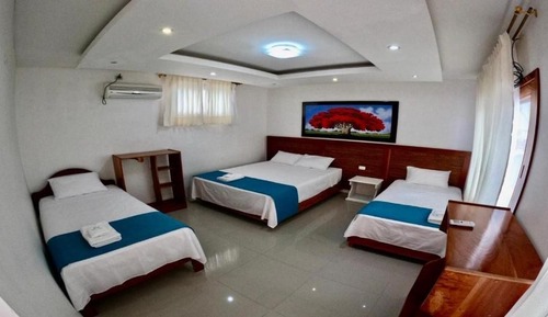 Deluxe Triple Room, Multiple Beds, Patio, Pool View