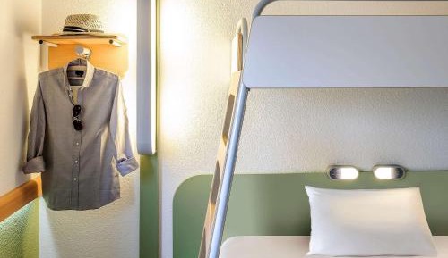 Room with One Queen Bed and One Bunk Bed