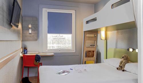 Room with One Queen Bed and One Bunk Bed