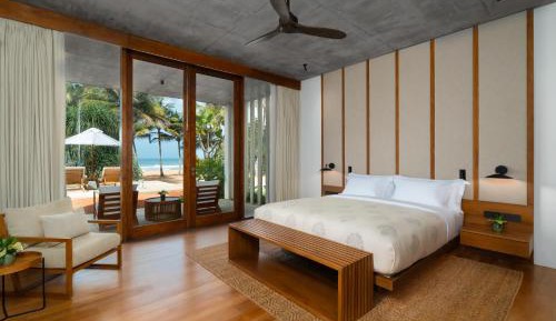 Premium King Suite with Ocean View - Complimentary 15 Mins. Head & Shoulder Massage for Two, Airport Drop (to BIA) per Stay, Evening Tea Service & Snacks, 10% Discount on F&B and Spa