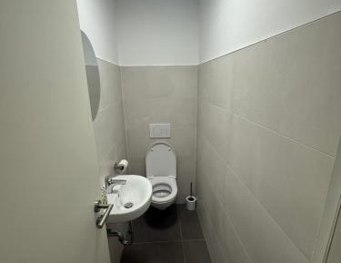 Four-Bedroom Apartment with Balcony 