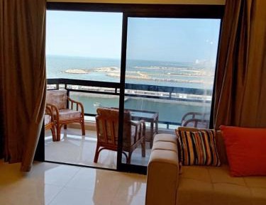 Two-Bedroom Apartment with Balcony and Sea View