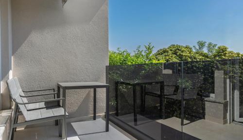 One-Bedroom Apartment with Balcony and Sea View