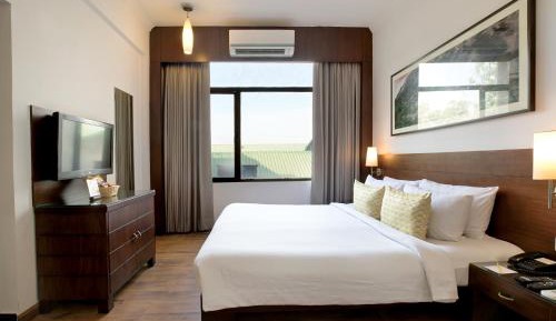 Business Room (Sleeps 3) (Complimentary Hi-Tea ,Complimentary Welcome Drink on arrival,15% Off on Laundry service)