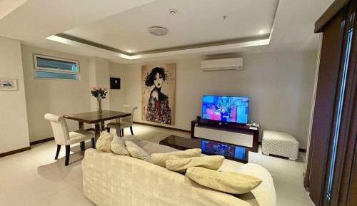 One-Bedroom Apartment with Balcony and Water View