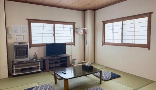 Quadruple Room with Shared Bathroom