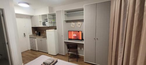 One-Bedroom Apartment with Balcony and City View
