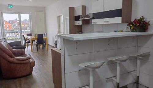Four-Bedroom Apartment with Balcony 