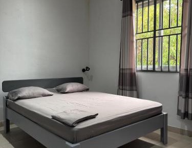 Four-Bedroom Apartment with Balcony 