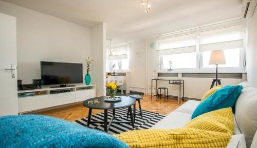 Two-Bedroom Apartment with Balcony and City View 