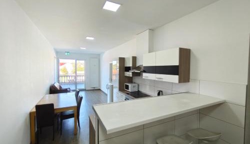 Four-Bedroom Apartment with Balcony 