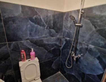 Quadruple Room with Private Bathroom