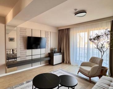 One-Bedroom Apartment with Balcony and Sea View