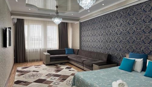 One-Bedroom Apartment with Balcony and City View