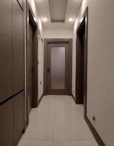 Three-Bedroom Apartment with Balcony