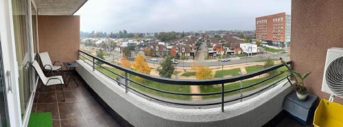 One-Bedroom Apartment with Balcony and City View