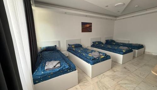 Quadruple Room with Private Bathroom